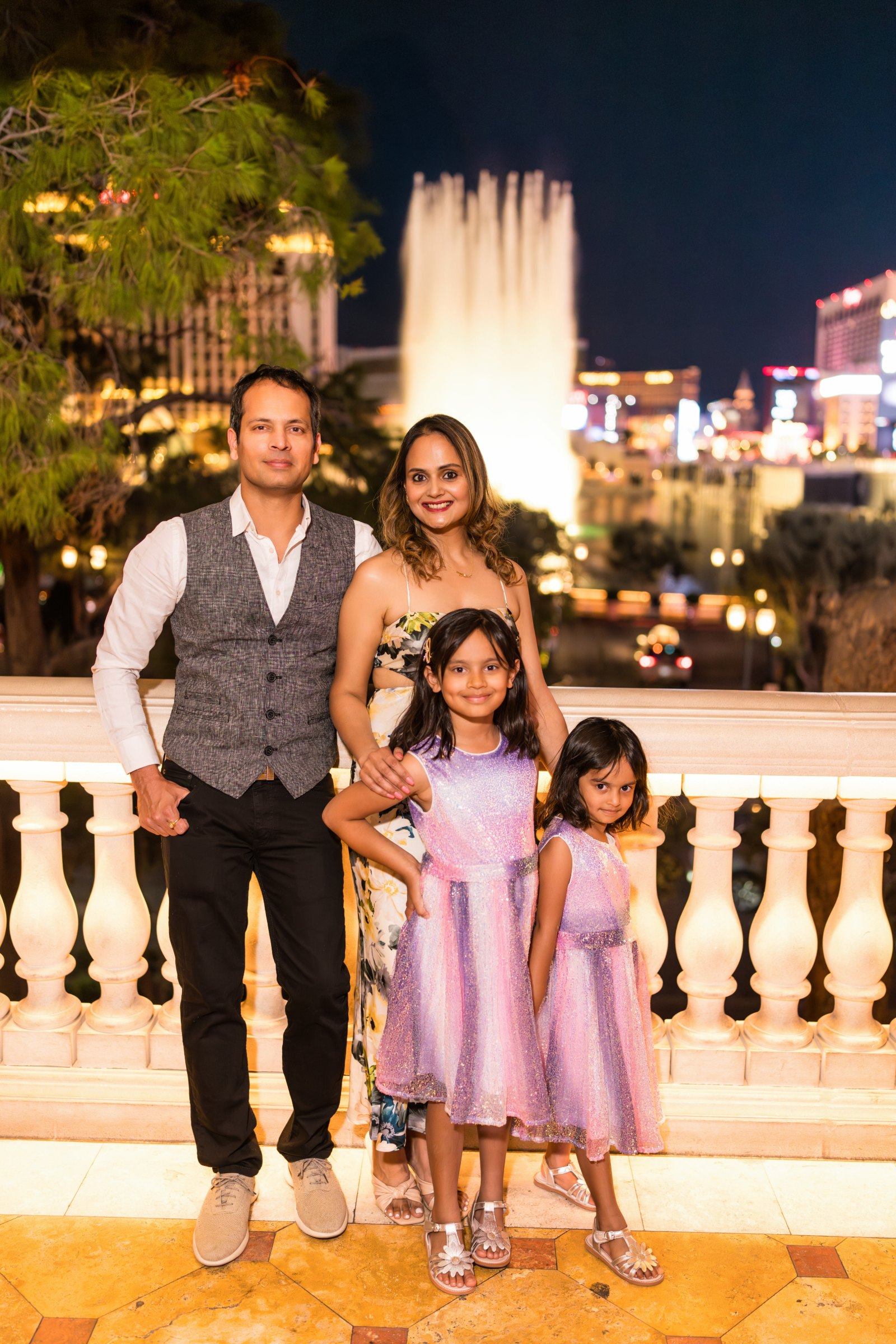 Family portrait at the Bellagio Fountains, Las Vegas Strip at night